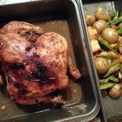 A picture of Oven Roasted Whole Herbed Garlic Chicken.