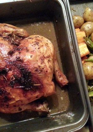 A picture of Oven Roasted Whole Herbed Garlic Chicken.