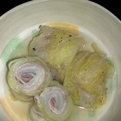 A picture of Chinese Cabbage and Pork Belly Wraps Simmered in Soup.