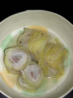 A picture of Chinese Cabbage and Pork Belly Wraps Simmered in Soup.