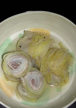 A picture of Chinese Cabbage and Pork Belly Wraps Simmered in Soup.
