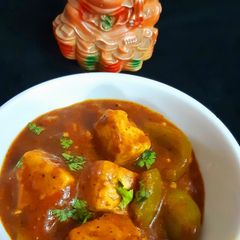 A picture of Chilli Paneer with Gravy.