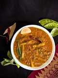 Pui Shake Diye Bhaja Muger Dal (Roasted Moong Dal Cooked With Malabar Spinach - Bong Style)