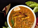 Pui Shake Diye Bhaja Muger Dal (Roasted Moong Dal Cooked With Malabar Spinach - Bong Style)