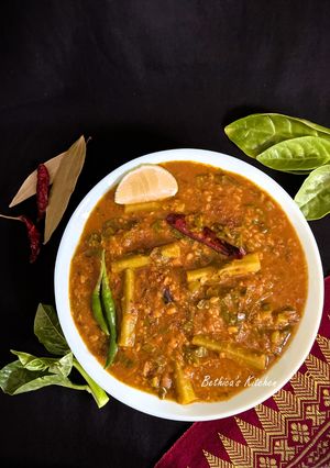 A picture of Pui Shake Diye Bhaja Muger Dal (Roasted Moong Dal Cooked With Malabar Spinach - Bong Style).