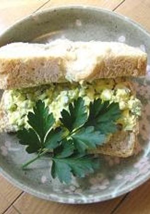 A picture of Old School Lunch-Style Egg and Cucumber Salad Sandwiches.