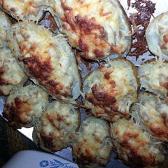 A picture of twice baked stuffed potato wedges.
