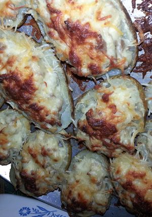 A picture of twice baked stuffed potato wedges.