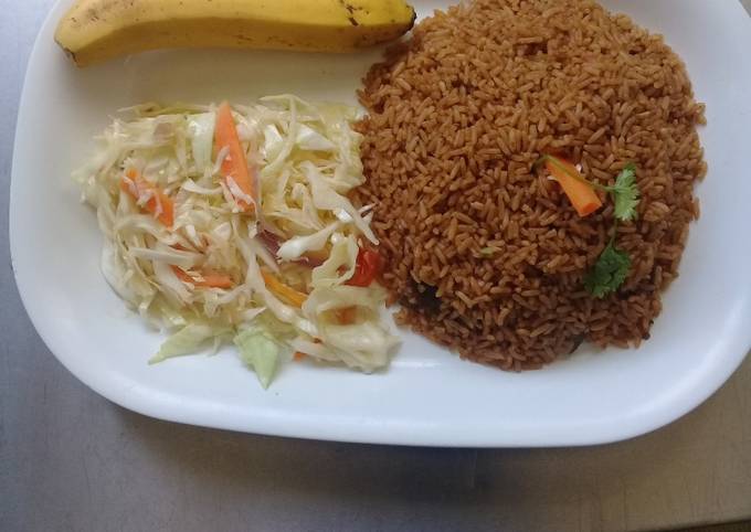 Beef pilau Rice, steamed cabbages n a banana