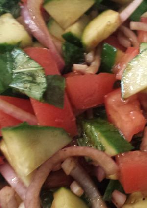 A picture of Tomato basil cucumber salad.