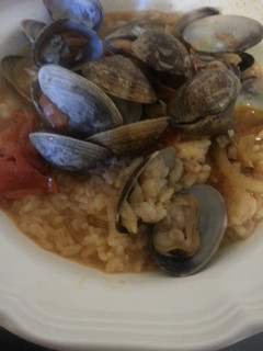 A picture of Clams and rice.