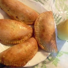 A picture of sweet potato empanadas.