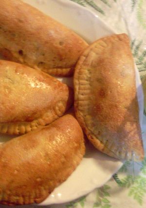 A picture of sweet potato empanadas.
