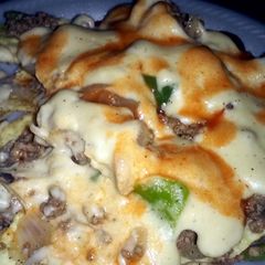 A picture of Philly steak nachos.