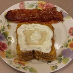 A picture of Crusted french toast with banana puree.