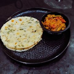 A picture of Rice Sesamey Masala Roti.