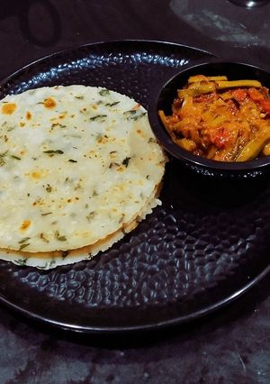 A picture of Rice Sesamey Masala Roti.