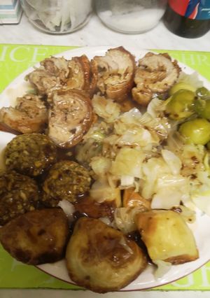 A picture of Rolled Pork belly stuffed with Sage and onion stuffing.