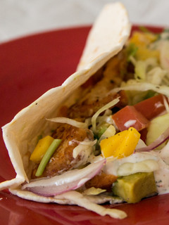 A picture of Fish Tacos & Slaw with White Sauce.