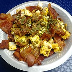 A picture of Bacon egg and sausage salad.