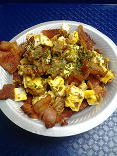A picture of Bacon egg and sausage salad.