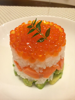 A picture of Salmon Caviar and Avocado Sushi Cake.