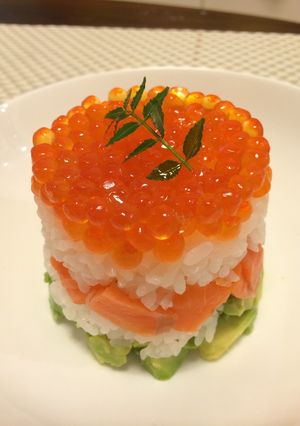 A picture of Salmon Caviar and Avocado Sushi Cake.