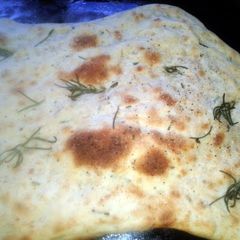 A picture of Rosemary and thyme focaccia.