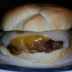 A picture of T's Bomb Cheese Burger.