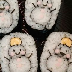 Decorated Sushi Rolls: Snowmen Nori Rolls A picture of Decorated Sushi Rolls: Snowmen Nori Rolls.