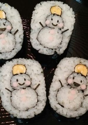 A picture of Decorated Sushi Rolls: Snowmen Nori Rolls.