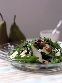 A picture of Brie, Pear, Cranberry, and Walnut Salad.