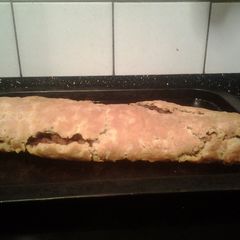 A picture of Baked bacon and onion roly poly.