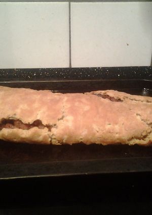 A picture of Baked bacon and onion roly poly.