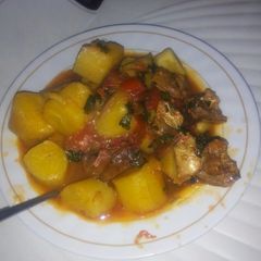 A picture of Stewed matoke with meat.
