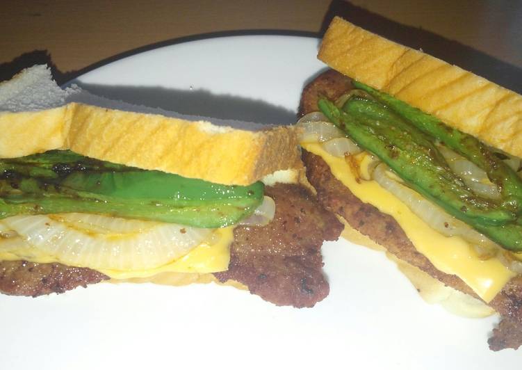 Steps to Make Any-night-of-the-week Fried pork chop jalapeno onion and cheese sandwich