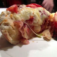 A picture of Bacon and Peperoni Pizza, Chicago Style.
