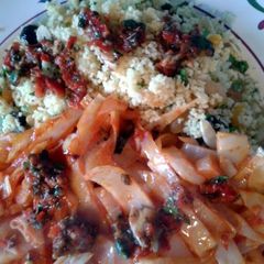 A picture of Fruity Couscous with Cabbage & Harissa Sauce (vegan).