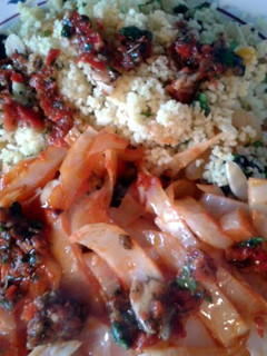 A picture of Fruity Couscous with Cabbage & Harissa Sauce (vegan).
