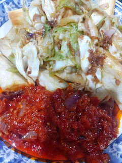 A picture of Fried yam with cabbage sauce.