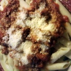 A picture of Penned Pasta with Meat Sauce.