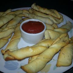 A picture of Herb and garlic cheese twists.