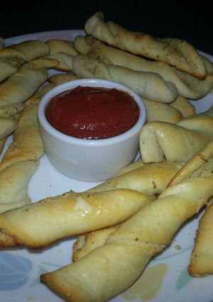 A picture of Herb and garlic cheese twists.