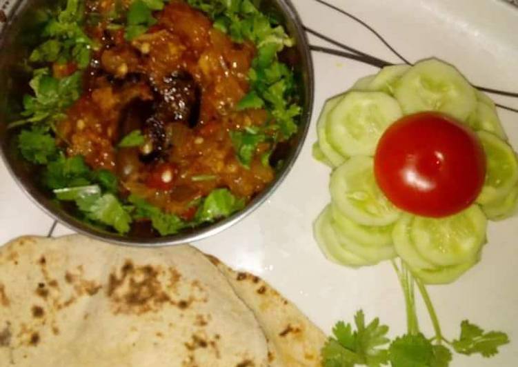 Achari baingan bharta with chapati and salad