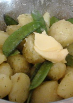 A picture of My New Potatoes in Garlic Parsley Butter with Pea Pods 😙.