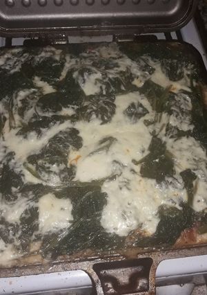 Una foto de Pizza de polenta y espinacas