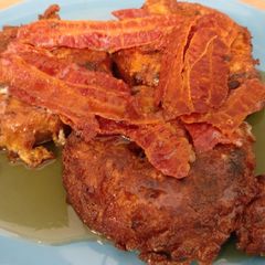 A picture of Chipotle Chilli Egg Crumpets with Crispy Bacon and Maple Syrup.