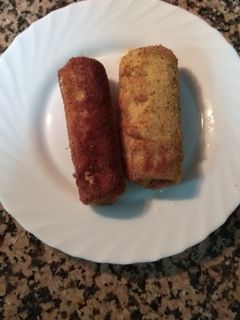 Una foto de Salchicha rebozada con queso