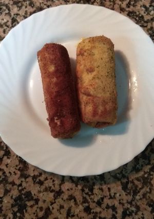 Una foto de Salchicha rebozada con queso