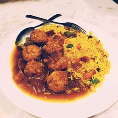 Vegetables Manchurian gravy with fried rice A picture of Vegetables Manchurian gravy with fried rice.